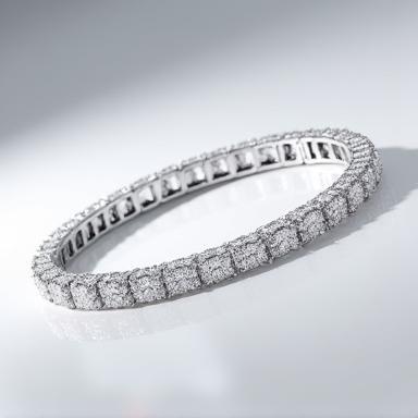 Tennis bracelet with numerous small diamonds.